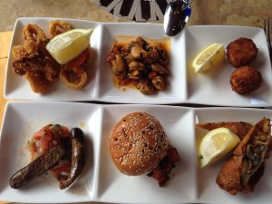 Left-to-Right, Top-to-Bottom: calamari, mussels, cod croquettes, sausage, lamb slider, chicken roll